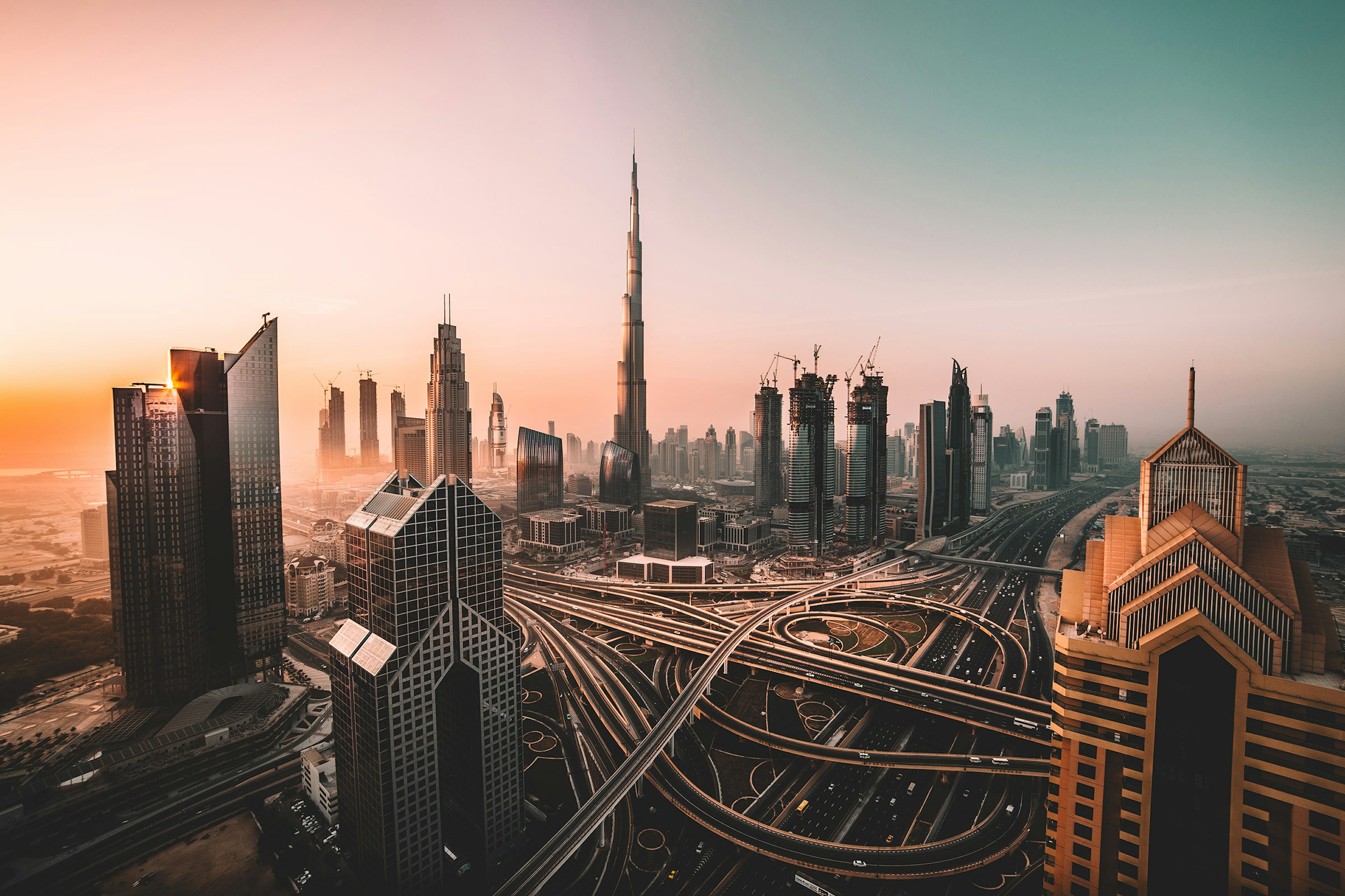 Dubai skyline at sunset with the Burj Khalifa
